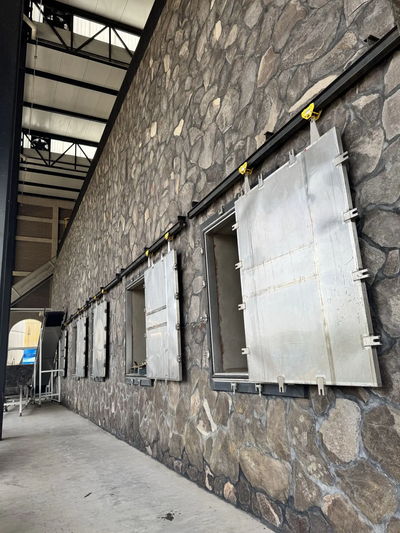 Brick ovens loaded with agave